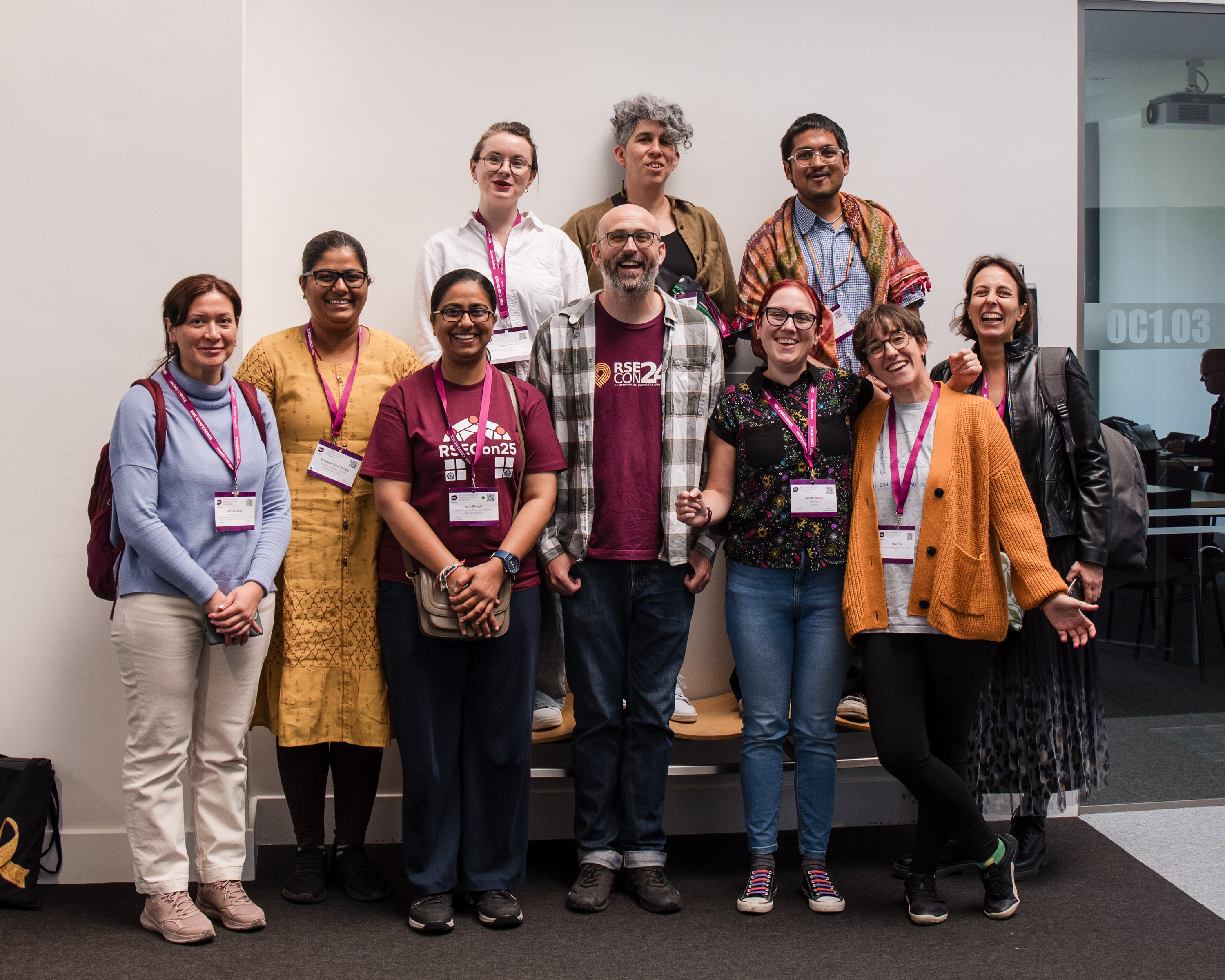 Group photo from all OLS-related people attending RSEcon25. From left to right, bottom to up: Patricia, Saranjeet, Jyoti, Toby, Sarah, Sara, Alecs, Arielle, Riva and Aman